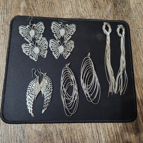 4 pair of silver toned earrings - Picture 1 of 14